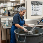 How Should Food Workers Keep Garbage Cans Clean and Free of Buildup?